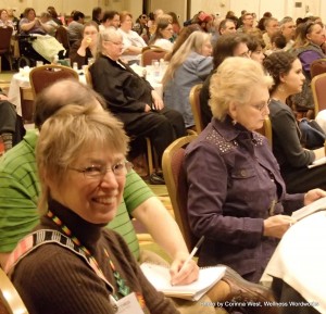 OLYMPUS DIGITAL CAMERA My mom, Gwen Broz, with Dr. Jean Campbell in the background at Alternatives 2012. She spoke on using spiritual traditions in modern culture.