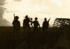 A Bill to Explore the Relationship Between Veteran Suicides and Prescription Medication a silhouette of four soliders