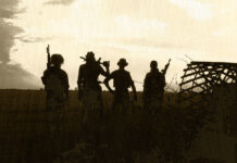 A Bill to Explore the Relationship Between Veteran Suicides and Prescription Medication a silhouette of four soliders