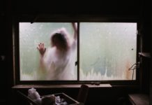 7 Tasks for a Parent Whose Child Is Diagnosed with a Mental Illness young girl at a window on rainy day