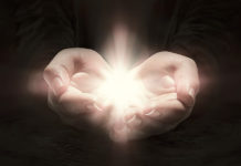 Overcoming the Madness in Us All heart hands hold light love