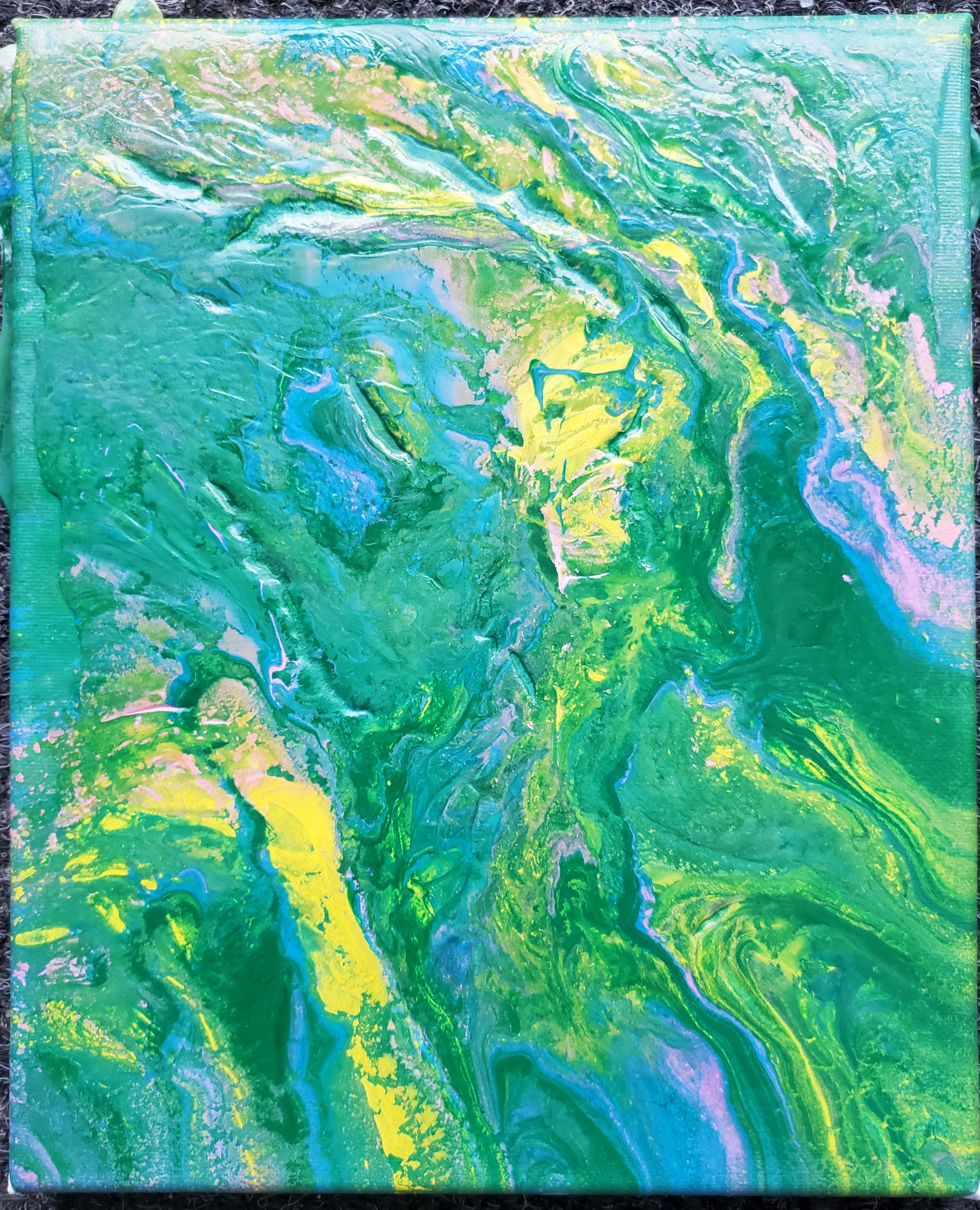 swirling green and yellow paint