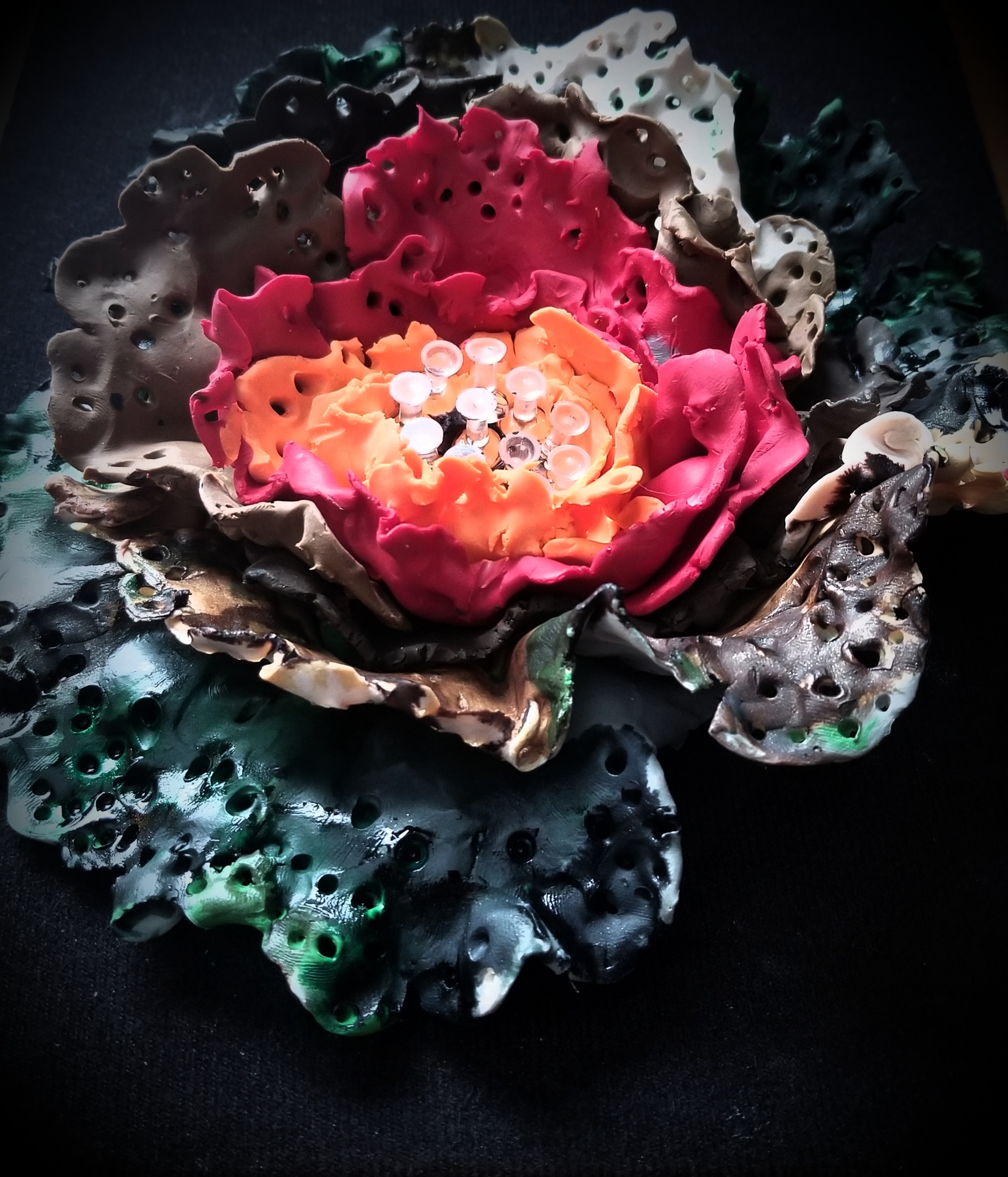 Photo of a clay sculpture of a flower