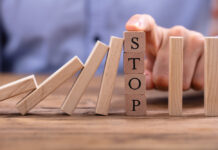 Susan Inman Is at It Again Photo depicting blocks falling over until they reach a block labeled "STOP"