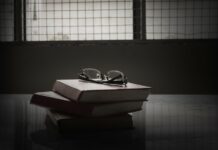 Inside a Forensic Psychiatry Unit: Access to the Courts—A Right and Survival Tool Photo of books on a table in a prison