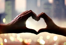 Engaging “Madness”: A Guide for Significant Others and Families Silhouette of man and woman's handsin form of heart