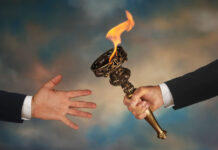 And Finally Passing a flaming torch to another open hand