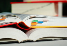 Psychiatry Textbooks Are Filled with Errors and Propaganda Close-up photo of two textbooks, open, one on top of the other