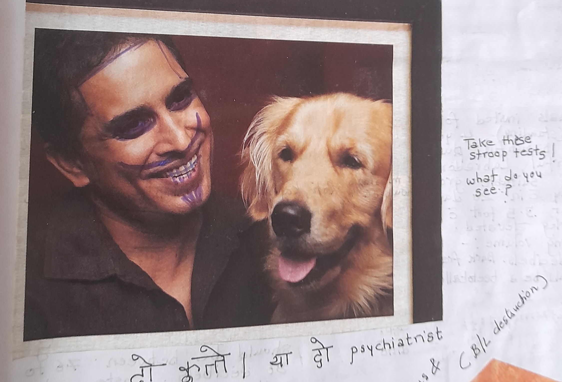 Man with drawing on face and dog