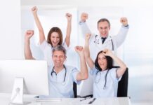 In Defense of Incoherent Psychiatry Group Of Happy Excited Doctors Raising Arms