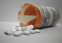Critical Psychiatry Textbook, Chapter 8: Depression and Mania (Affective Disorders) (Part Three) A pill bottle on its side spills white tablets out (photo)