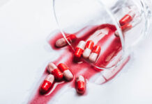 Critical Psychiatry Textbook, Chapter 8: Depression and Mania (Affective Disorders) (Part Eight) Red and white pills have spilled from a crystal dish along with red liquid