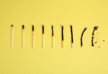 How Does Untreated “Burnout” Manifest? Different stages of burnt matches on yellow background, flat lay