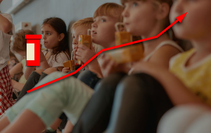 Sitting children in a row. A red graph marked with a red pill bottle increases from left to right