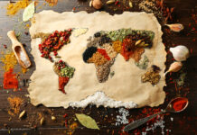 A Bold Critique of Global Mental Health’s Expansion and Scalability Map of world made from different kinds of spices on wooden background