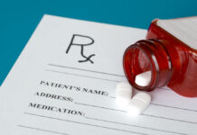 Reflections on the RADAR Study Prescription pills and red bottle on Rx form