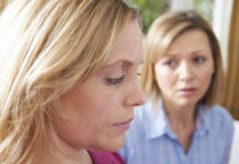 “Get Over It”? A Response to Empower Parents to Repair Instead of Victim Blame Unhappy Woman In Converstion With Friend Or Counsellor