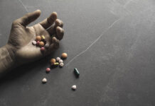 Prescription Drugs Are the Leading Cause of Death Close photo of a hand spilling pills on a floor