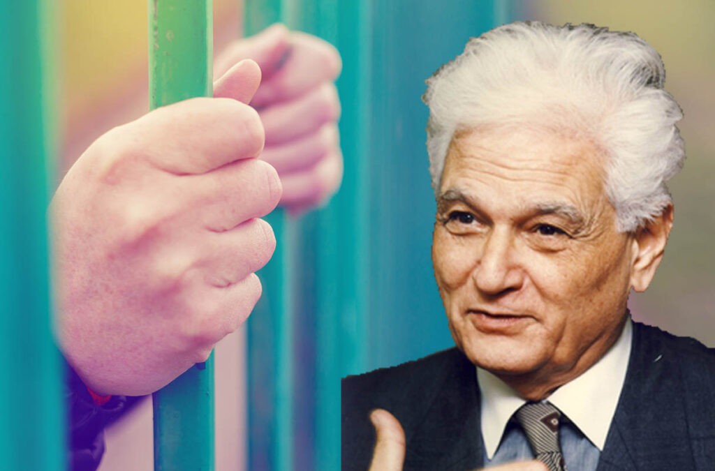Stock photo of hands on the bars of a cell, collaged with Derrida's face over the right side