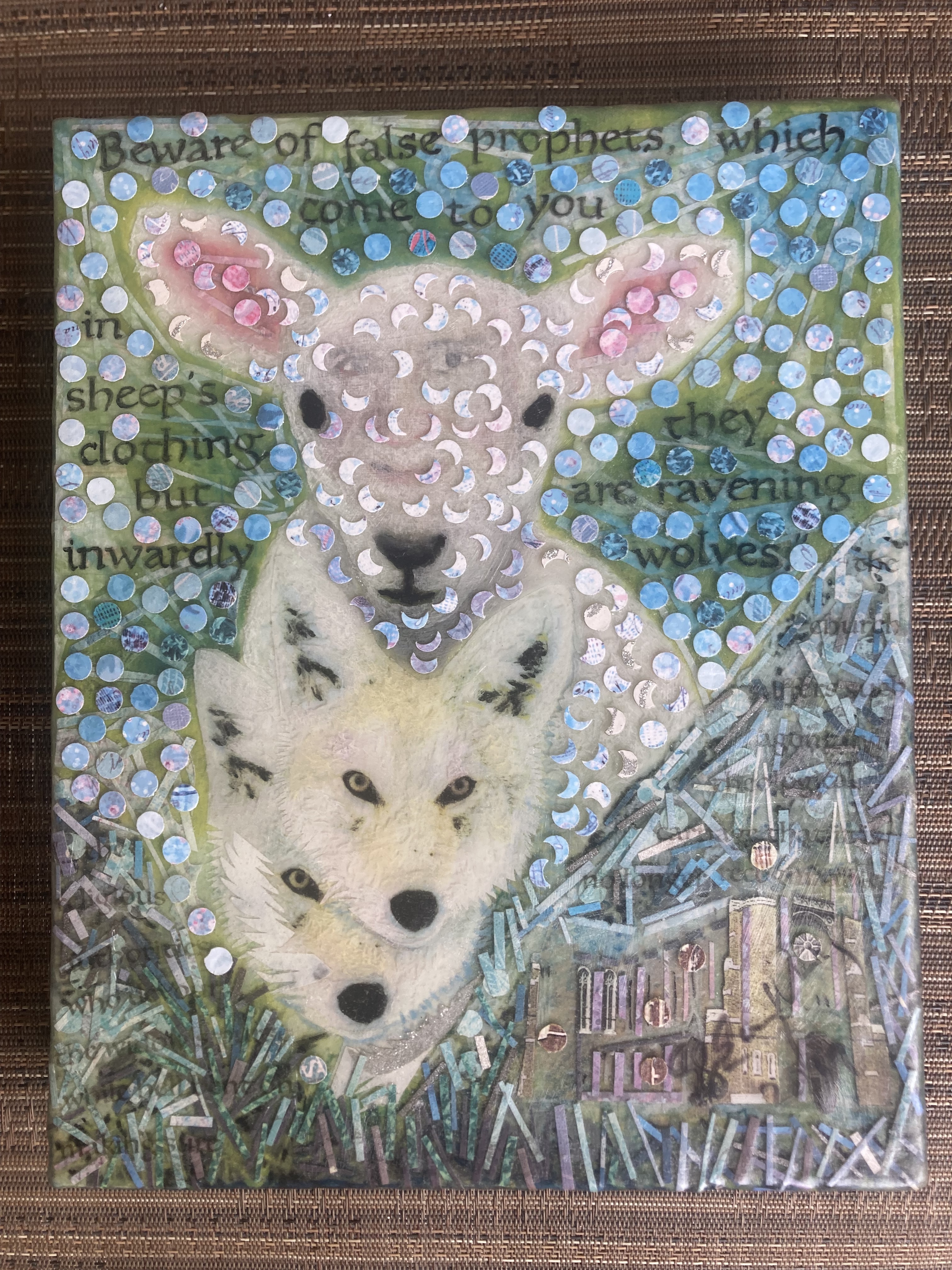 Sheep's face with two wolves' faces below, in composition with text (beginning "Beware of false prophets") and collage forms
