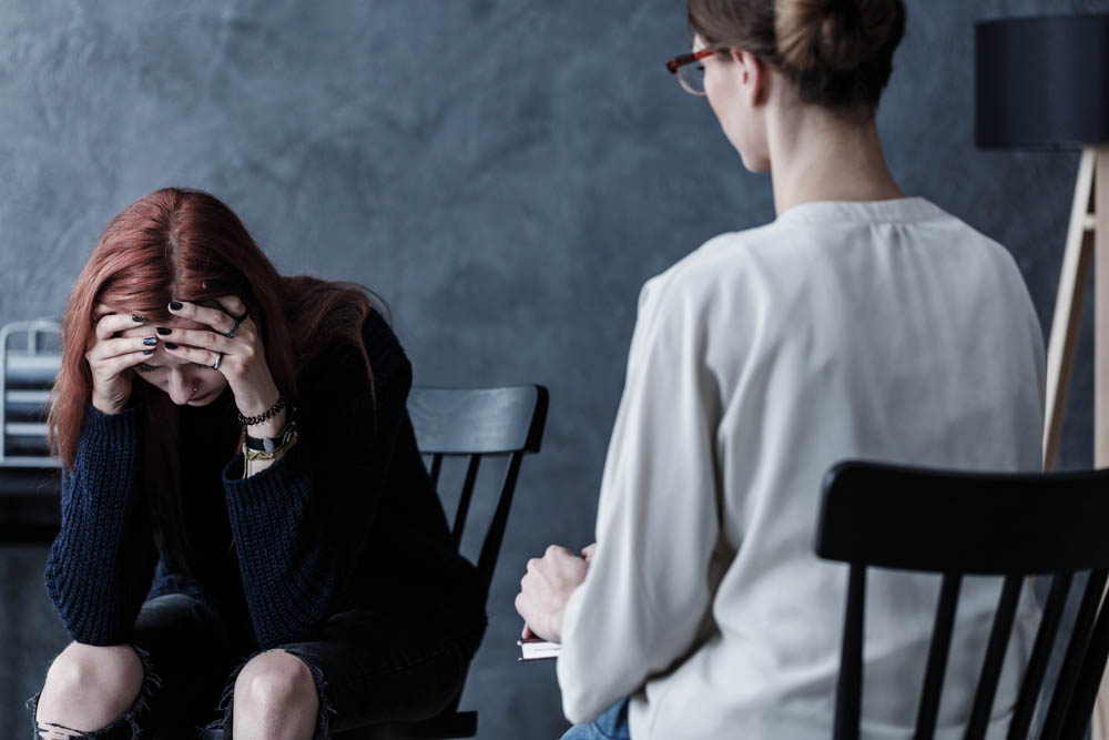 Two women, therapy session