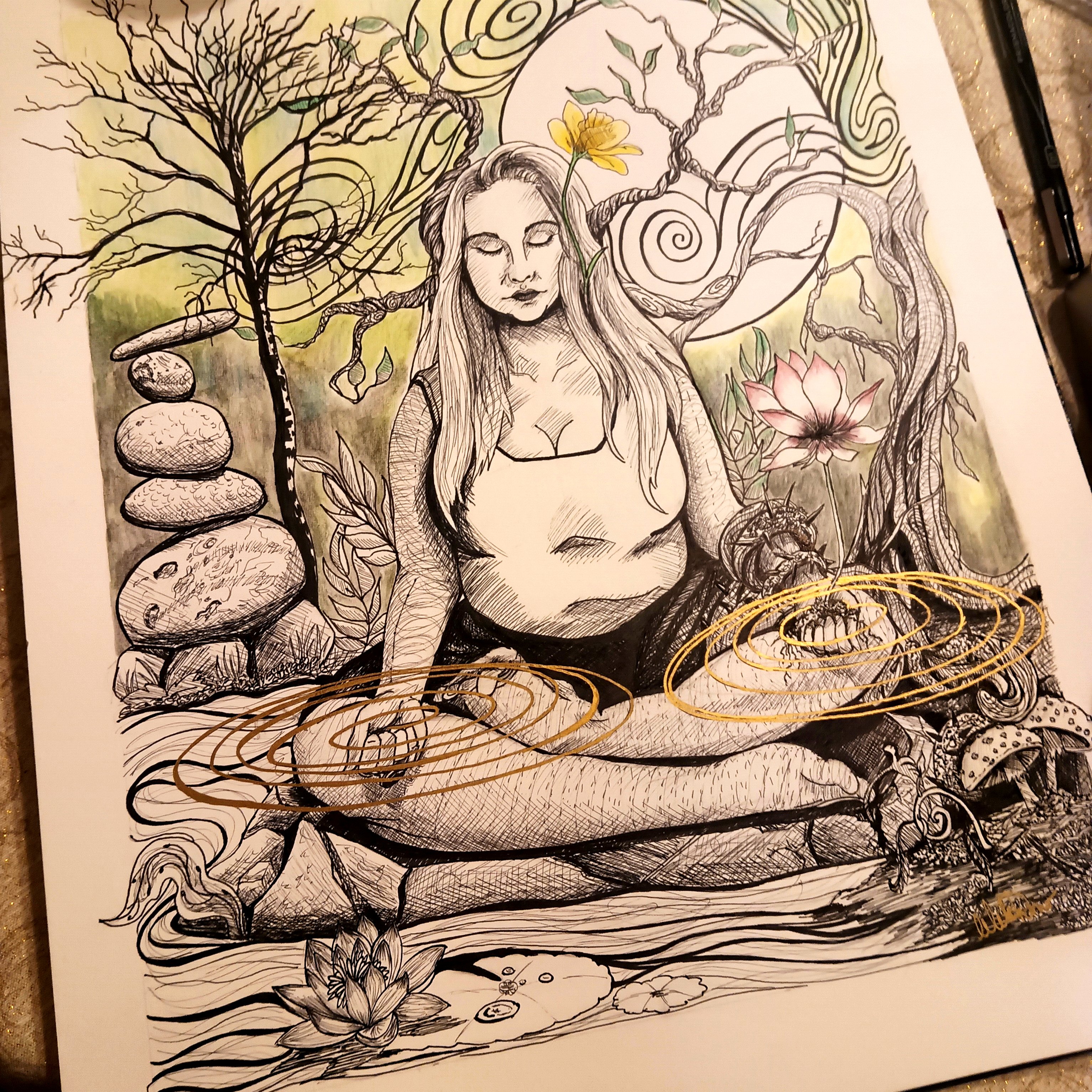 An ink and watercolor drawing of a woman sitting cross-legged in nature with closed eyes and a yellow flower tucked into her hair. A stream flows around her, a tower of rocks and a few trees are behind her, a moon shines above, and a pink-tinged lotus blossom rises from her left hand.