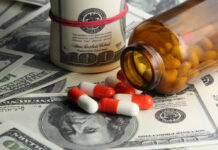 Industry Funding Biases Antidepressant Efficacy Findings A bottle of pills tipped over, spilling red and white pills onto a pile of hundred dollar bills