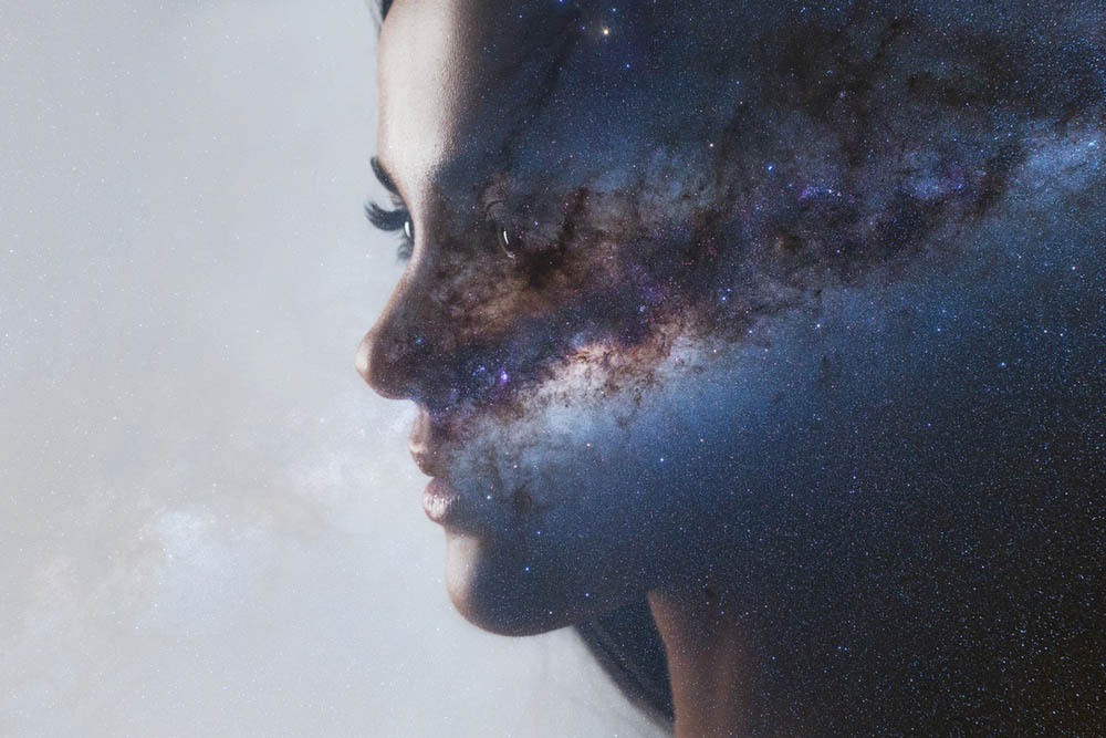 The universe inside us, the profile of a young woman and space, the effect of double exposure. scientific concept. The brain and creativity. Elements of this image furnished by NASA.