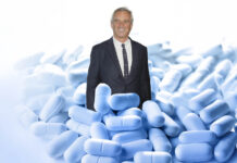 RFK Jr. May Be Wrong on Many Medical Issues, But He’s Right About Antidepressants A photo of RFK Jr. emerges from a pile of blue pills
