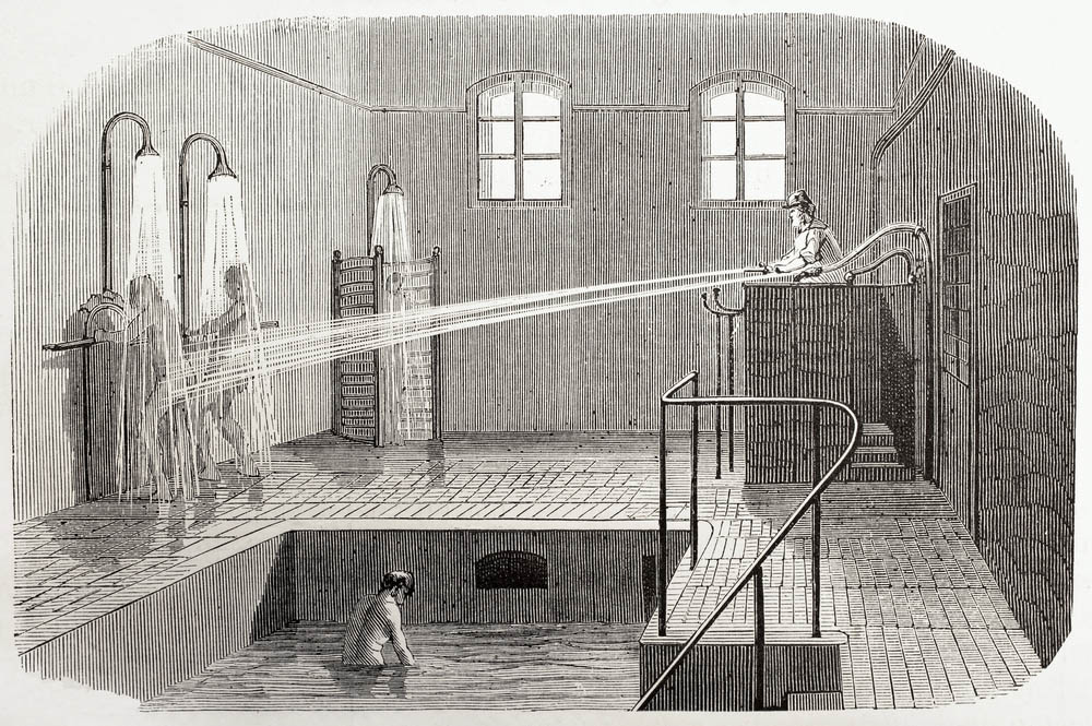 An engraving depicting water being shot at two prisoners; hydrotherapy