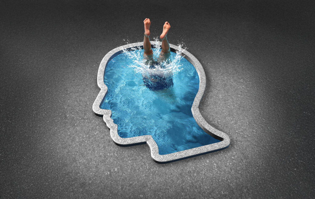 Illustration of a diver disappearing into a human head full of water