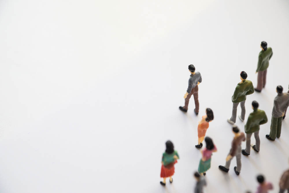 Miniature shot. People crowded in the lower right corner, walking