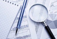 An Approach to Making Sense of Psychiatric Research A magnifying glass and pen on charts and data
