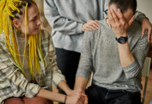 Trauma-Informed Care and the PTMF: How Does It Work in Practice? support group of young people in distress
