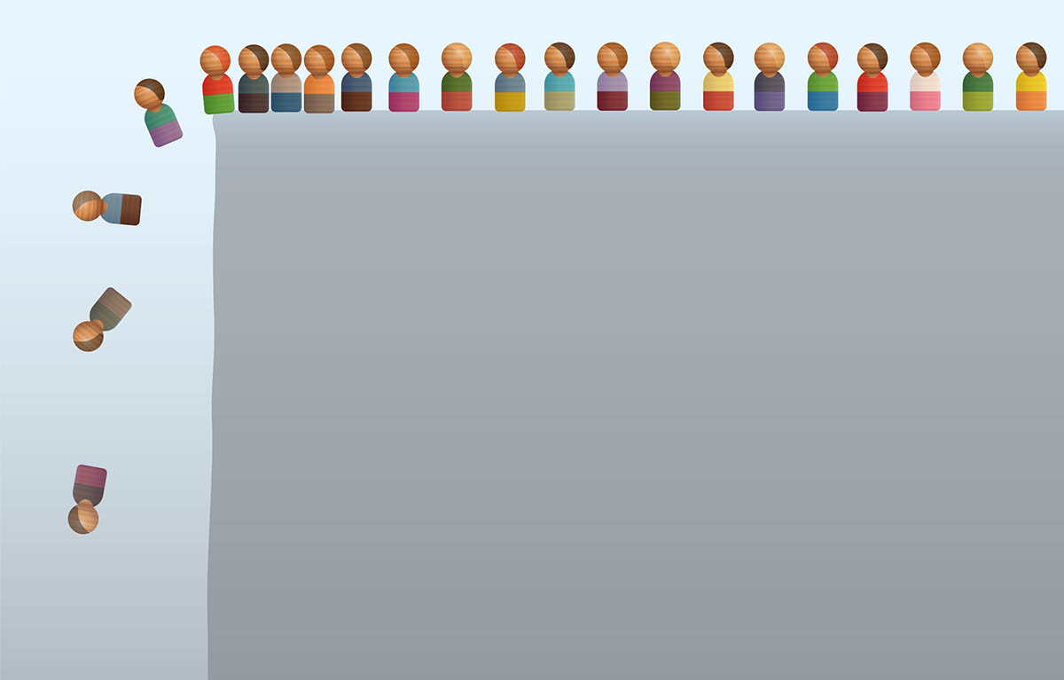 Toy figures approach and topple off a cliff