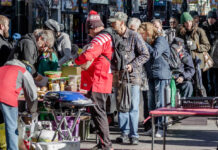 An Open Letter to Those I Love Whose Neurotypical Privilege Keeps Them from Seeing What They Need to See Calgary, Alberta, Canada - November 6, 2021: A small group of people providing a meal to the homeless and any other people in need in downtown Calgary