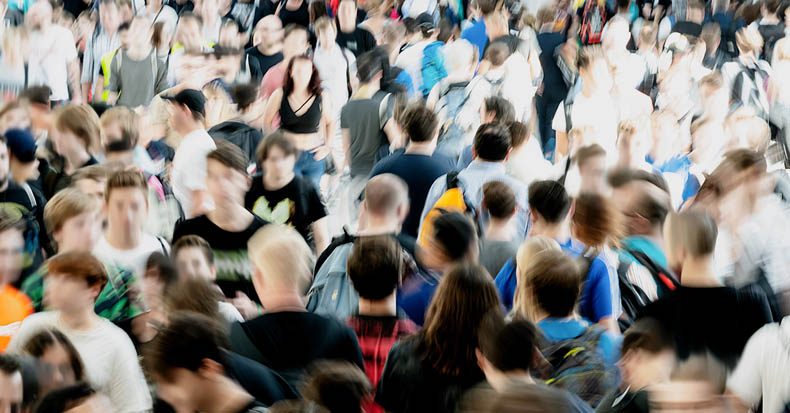 Blurry photo of a crowd of people