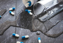Antidepressants Are Major Drivers of Suicides Water is spilled and medical capsules are scattered