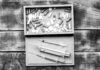 Getting Rid of the Pain Before Answering Its Questions: Psychiatry’s Damage to Self and Culture Pharmaceutical drugs pills and syringe vials in box on wooden background